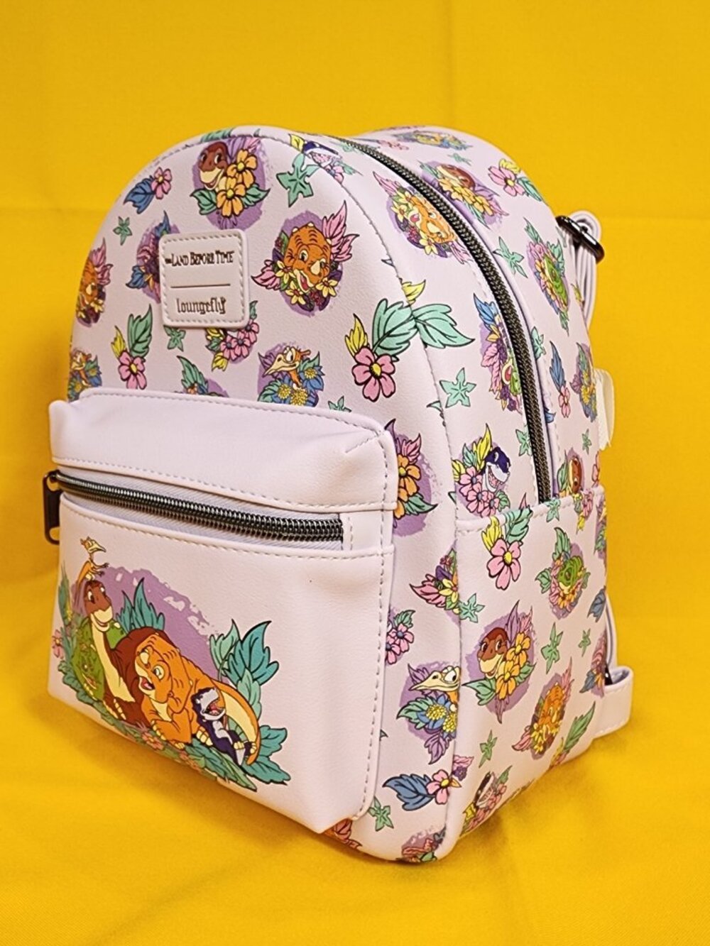 Loungefly The Land Before Time Dinosaurs Floral Purple Soft Tag Mini Backpack - Picture 8 of 11
